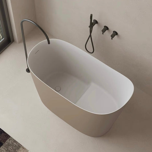 Light brown freestanding Japanese soaking bathtub made of stone resin, 43 inches deep and modern design
