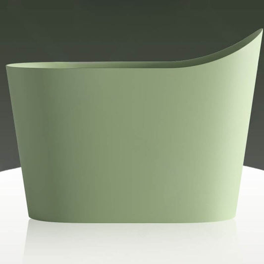Oval freestanding bathtub with single slipper design and built-in seat for comfortable soaking