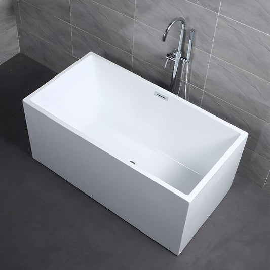 White rectangular back-to-wall bathroom tile installed near bathtub with cartridge faucet and handle
