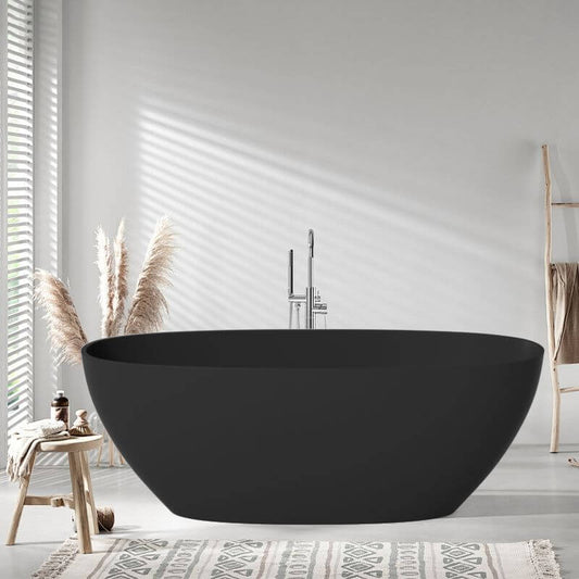 Stone oblong freestanding bathtub with antiqued wood distressing, roll top, valve, and overflow hole