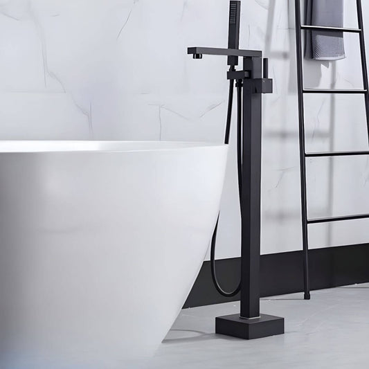 Copper floor mounted bathtub faucet with hand shower and handle for modern bathrooms