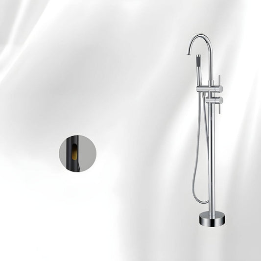 Copper floor-mounted bathtub faucet with hand shower and lever handles for modern bathrooms