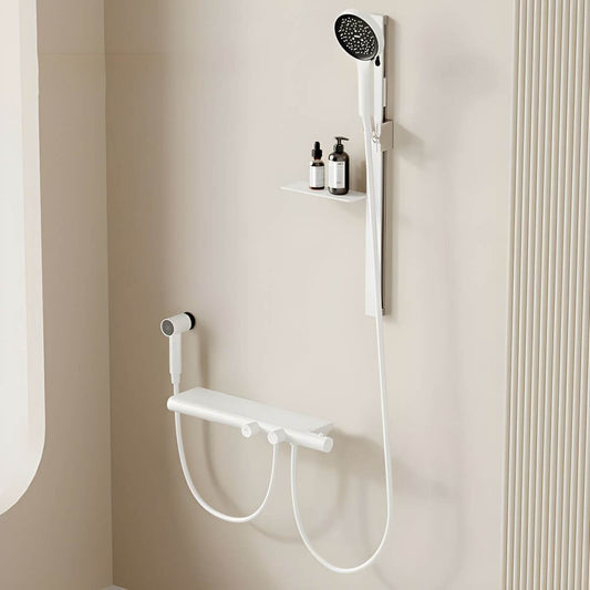 Wall-mounted bathtub spout with waterfall faucet, hand shower, and multiple handles for modern bathrooms