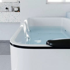 Modern 63-inch white bathtub with seamless design and bubble bath function