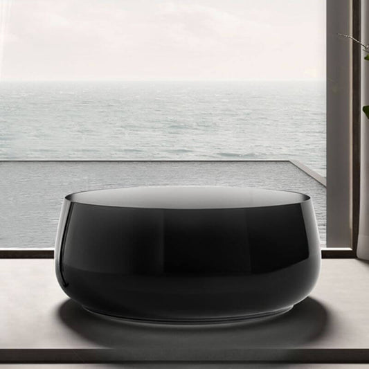 Freestanding circular resin bathtub with roll top design for casual soaking