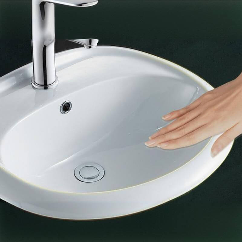 Sleek U-shaped ceramic sink with smooth finish