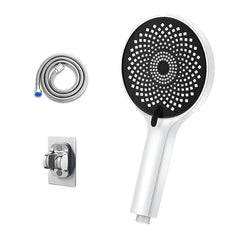 Handheld shower head with three spray patterns