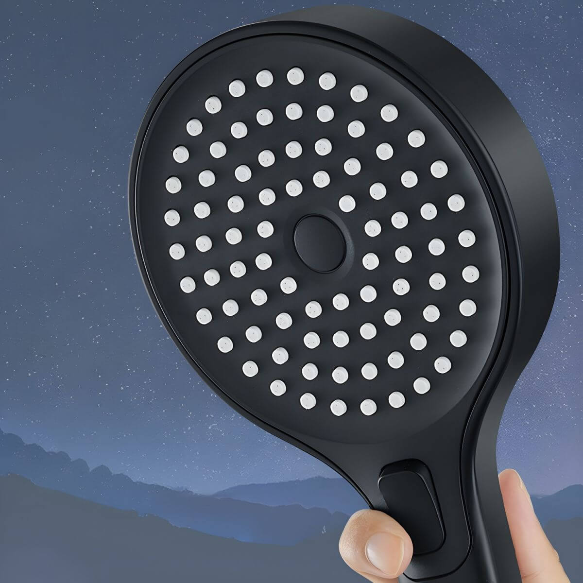 Silver round handheld shower head featuring adjustable sprays