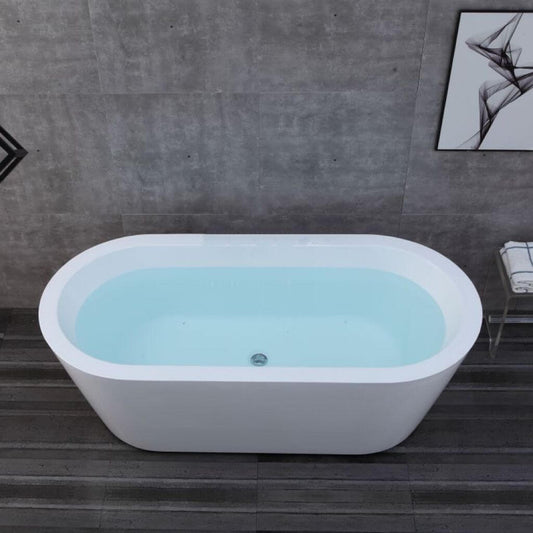 Oval shape white soaking tub against wall