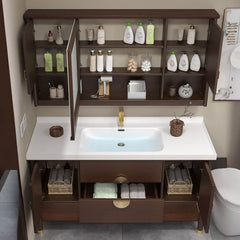 Brown bathroom vanity with stone countertop