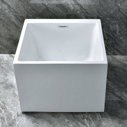 White acrylic freestanding bathtub with faucet