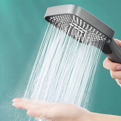 Handheld shower head with adjustable spray pattern