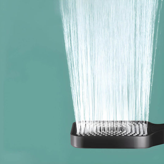 Handheld shower head with adjustable spray pattern