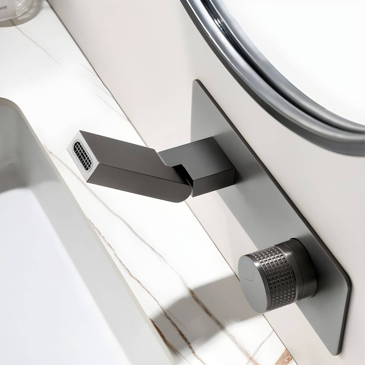 Sleek metal handle of wall mounted faucet