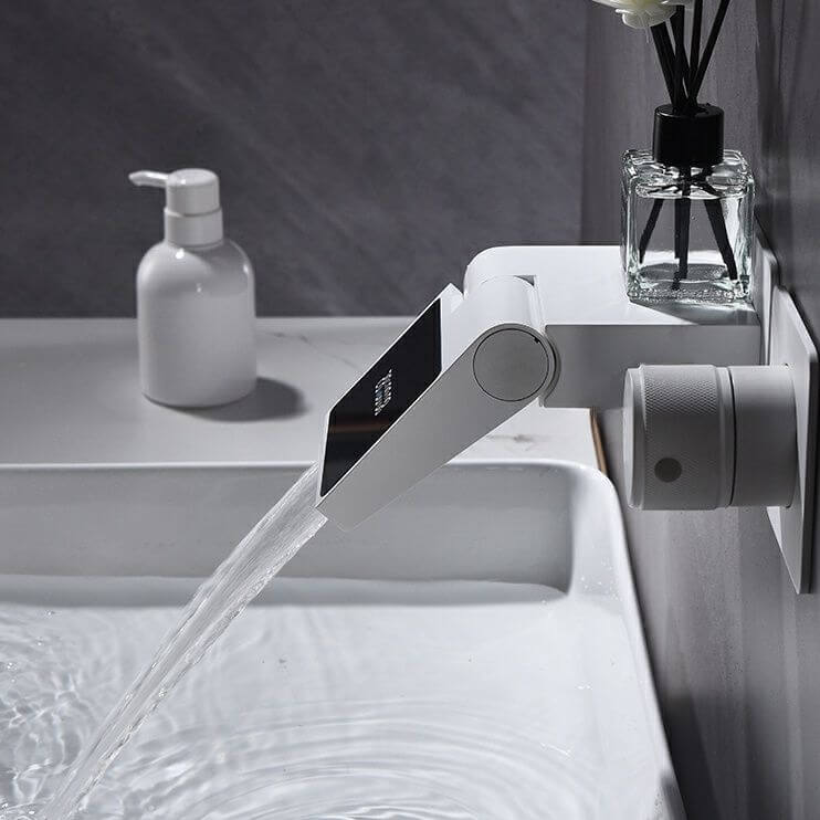 Wall mounted faucet with low arc spout