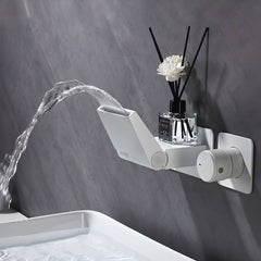 Chrome wall mounted faucet in a contemporary kitchen