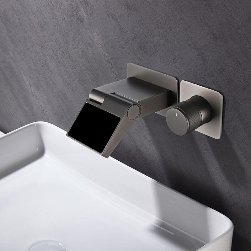 Sleek black wall mounted faucet with waterfall spout