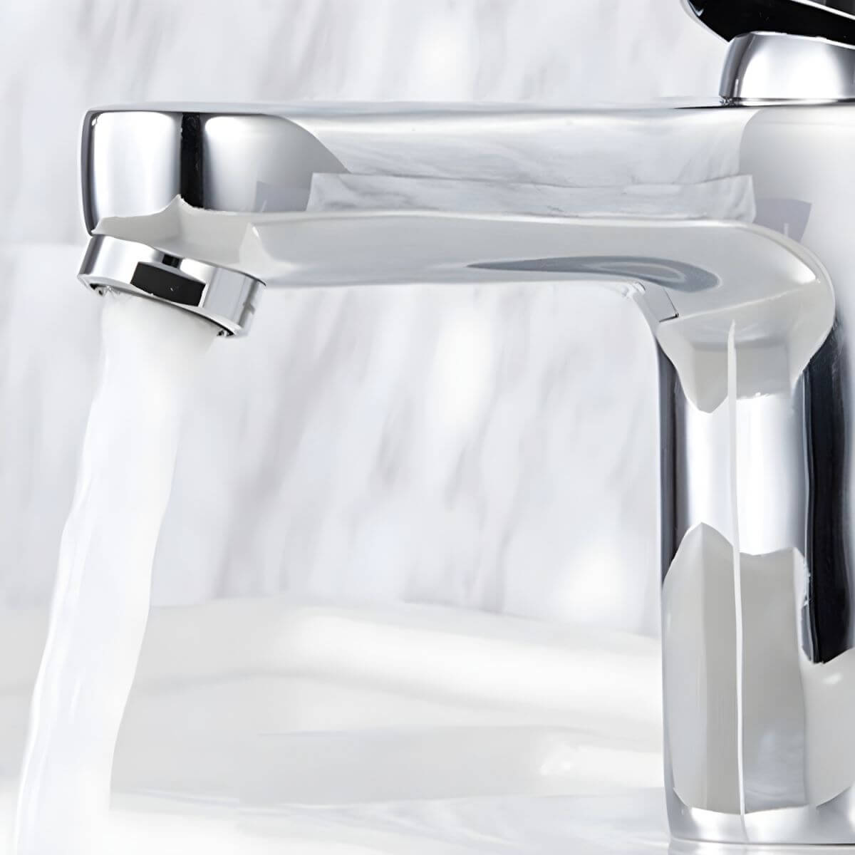 Close-up of the chrome vessel sink faucet