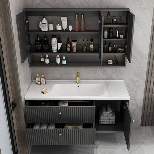 Gray bathroom vanity with metallic faucet