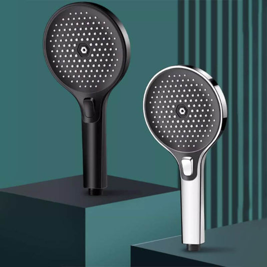 Handheld shower head with adjustable spray patterns