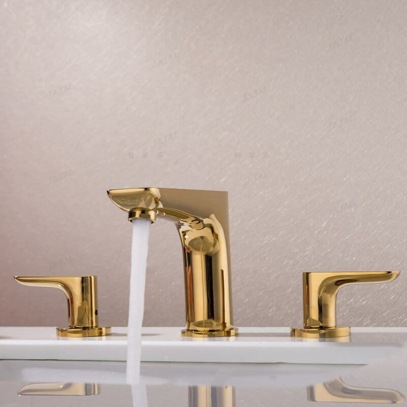 gold two-handle bathroom faucet