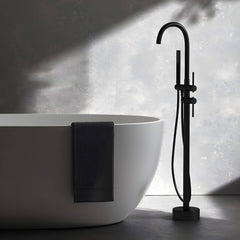 Modern floor mounted copper bathtub faucet side view