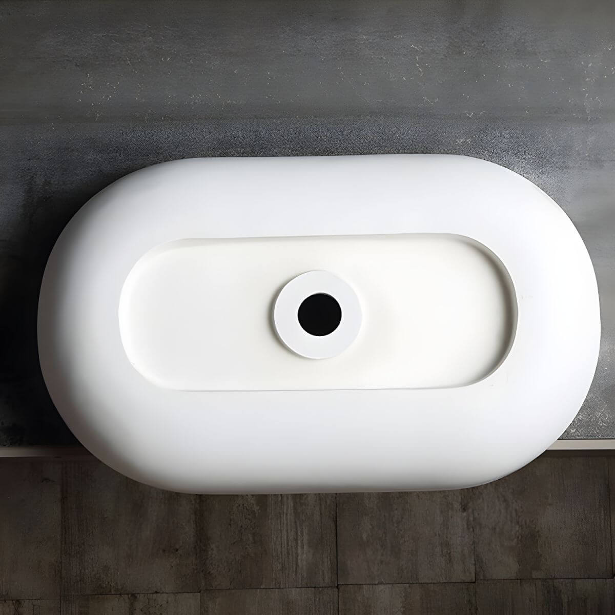 Matte White oval sink with elegant faucet