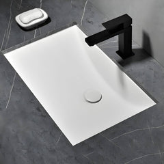 Undermount ceramic sink with pop-up drain feature