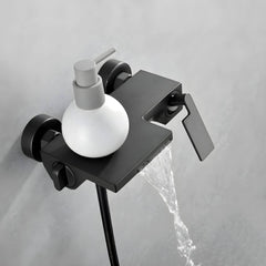 Waterfall faucet on bathtub spout