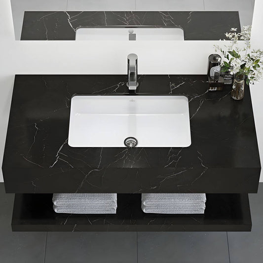 Sleek modern bathroom sink with faucet