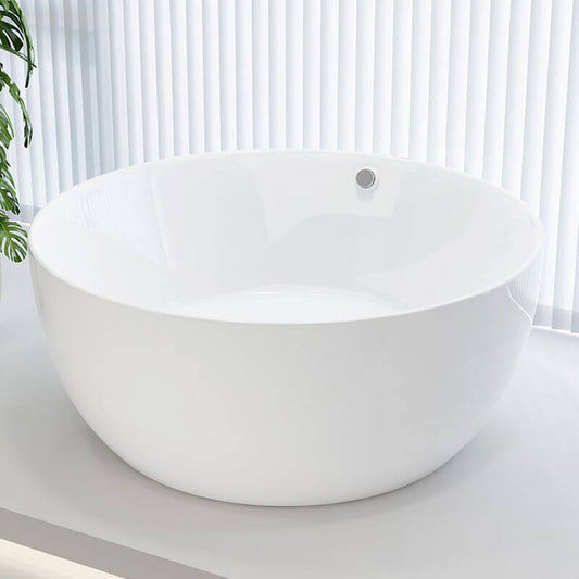 Contemporary bathroom featuring white bath tub