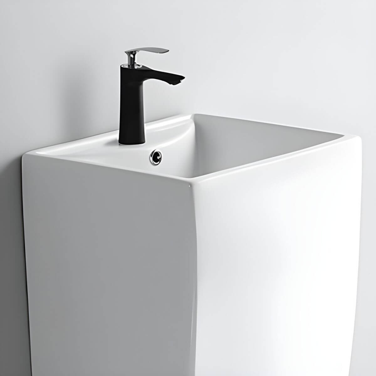 Sleek design of a white pedestal sink