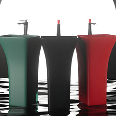 Red and black pedestal sinks on display