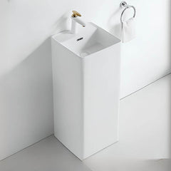 White ceramic pedestal sink front view