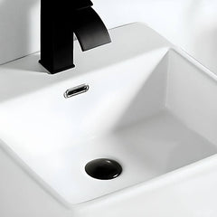 White ceramic pedestal sink front view