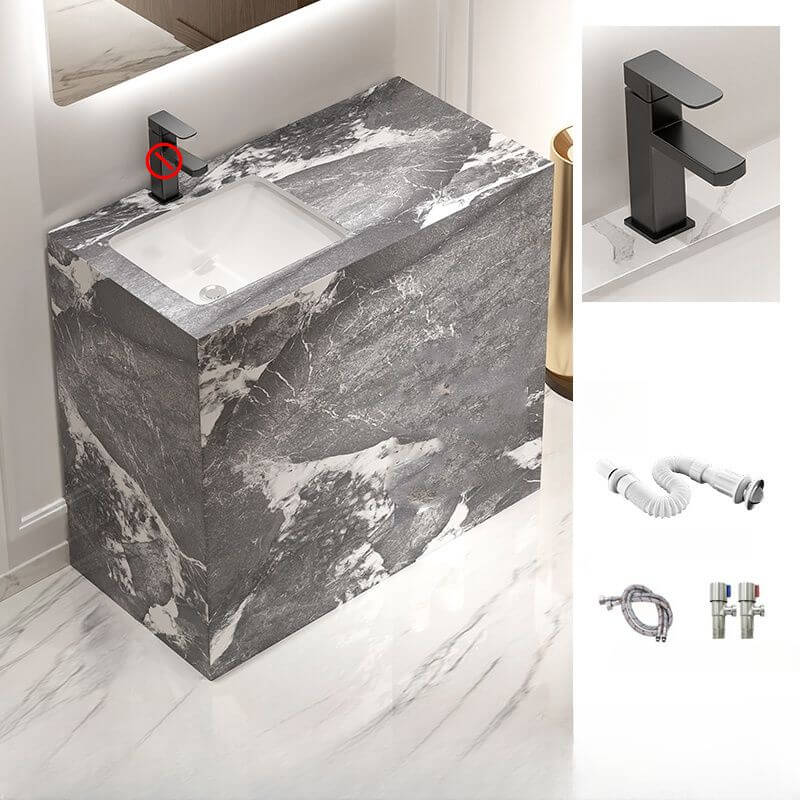 Stylish stone pedestal sink in modern bathroom setting