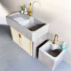 Sleek grey stone faucet with console installation type