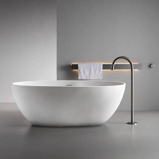 White freestanding bathtub in modern bathroom