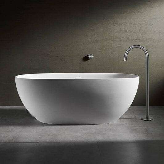 Oblong soaking tub with back wall design