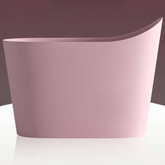 Oval freestanding bathtub with single slipper design and built-in seat for comfortable soaking