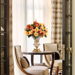 Artificial Orange Floral Arrangement in Gold Glass Planter