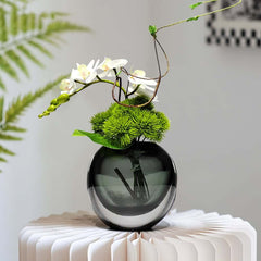 Artificial Orchid Floral Arrangement in Black Glass Planter