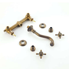 Chester Collection Wall Mount Bathroom Faucet in Antique Brass