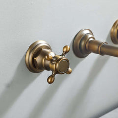 Chester Collection Wall Mount Bathroom Faucet in Antique Brass