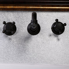 Chester Wall Mounted Bathroom Faucet in Antique Black Brass