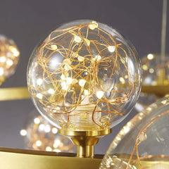 Gold 12-Light Globe Chandelier with Clear Glass Shades - Modern Elegance