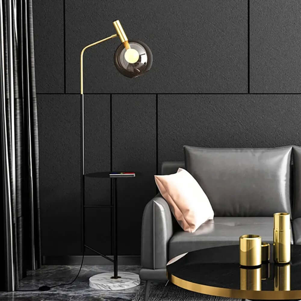 Modern Black and Gold Floor Lamp with Amber Glass Shade