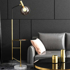 Modern Black and Gold Floor Lamp with Amber Glass Shade Main Product Image