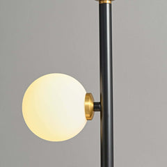 Modern Black and Gold Glass Floor Lamp with Ambient Lighting