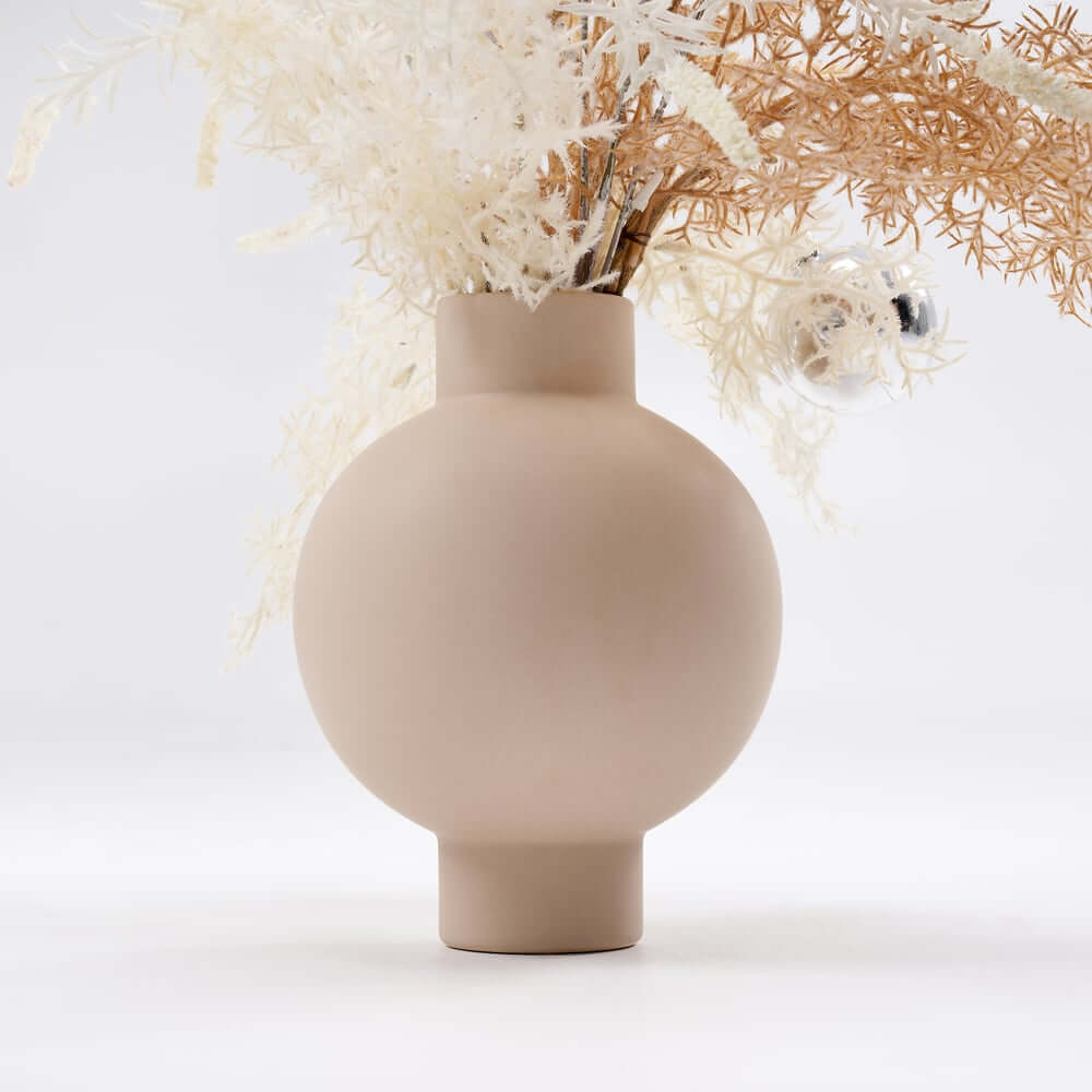 Modern Ceramic Floral Arrangement with Artificial Flowers and White Planter